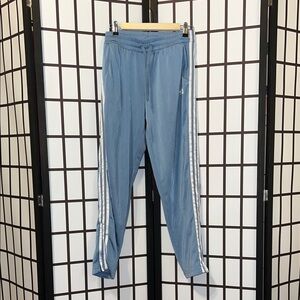Adidas Women's Light Blue Joggers with White Stripes